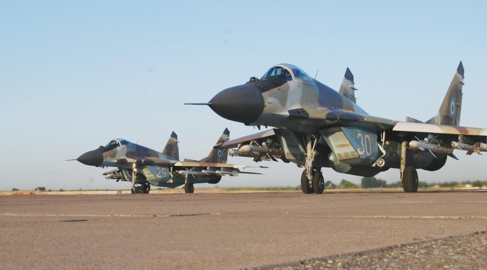 Uzbek MiG-29 (9-13) (30 & 29) taxiing (before 2019).jpg
