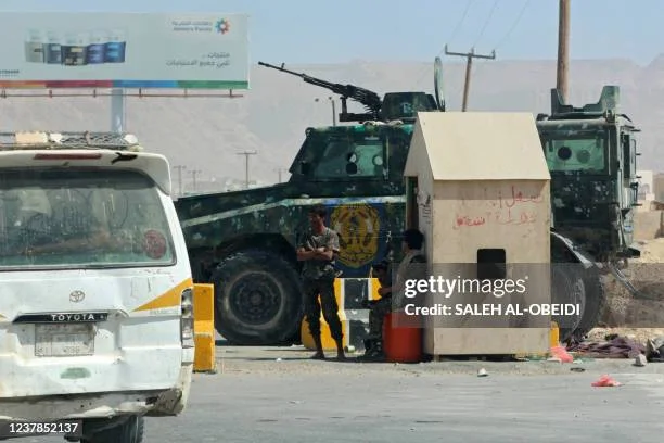 yemeni-pro-government-security-forces-man-a-position-man-a-checkpoint-in-ataq-city-the-capital.webp