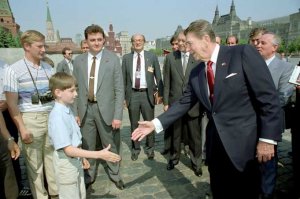 KGB Agent Vladimir Putin posing as family member during Reagan’s visit to Russia 1988.jpg