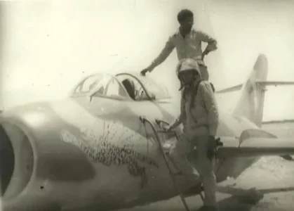 Somali MiG-17 on ground with pilot.webp