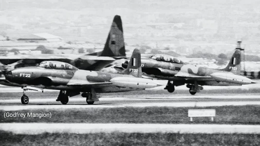 Belgian T-33 (FT22 & FT07) taking-off at at Malta - Luqa (6 July 1977).jpg