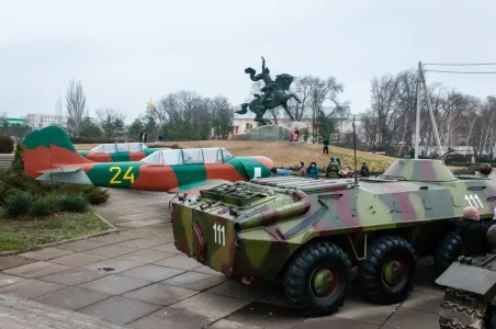 Transnistrian Yak-52 (24 yellow & one more) at Tiraspol (3 January 2014).jpg