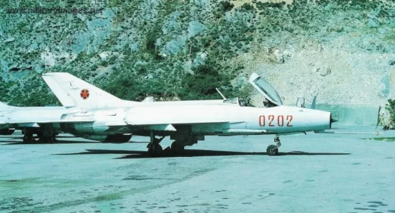 Albanian J-7 (0202 red) on ground.webp