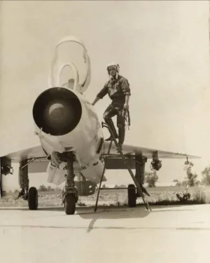 Albanian J-7 fitted with free-fall bombs on ground.webp