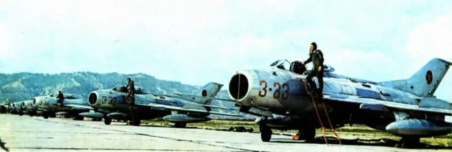 Albanian F-6 (3-33, 3-32, 3-31 red & more) on ground.webp