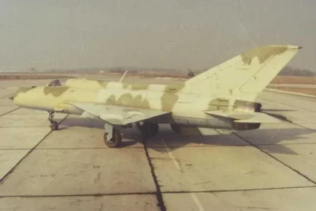 IRIAF MiG-21PFM' (unmarked) on ground.webp