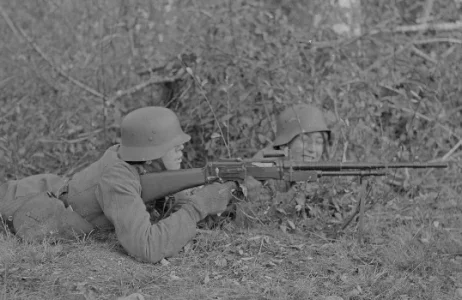 Finnish soldier, according original photo caption a beach sentry, with Belgian FN D.webp