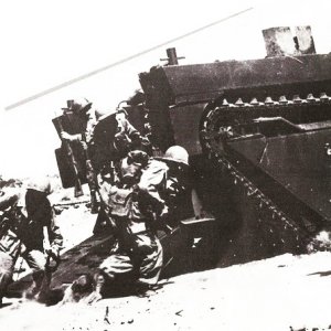 Troops disembark an LVT