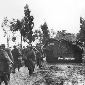 Infantry Marching On The Muddy Road Passing A Panther