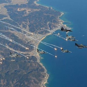 F-4s,F-5s,F-16s and F-15s deploying flares