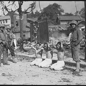 US. Marines with Three North Korean POW's, 1950