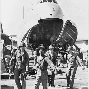 1952 October, Army Medics Carry Wounded UN Personnel To Wait