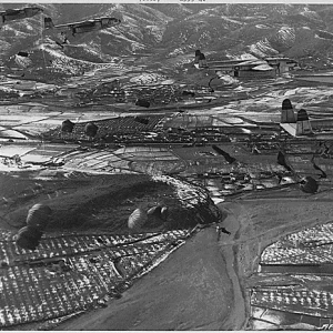 1952 August, Parachutes Billow Out Behind A Formation