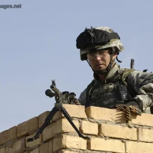 U.S. Army Sgt. sets up his M-240 machine gun