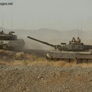 Leopard C2 tanks on the firing line at the range