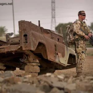 Lance Cpl Forman patrols the outskirts of As Samawah