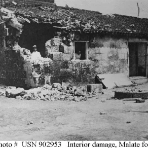 Photograph showing damage to one of the buildings