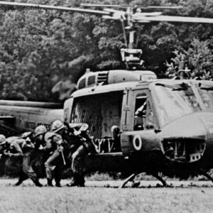 Blue Team Rifle Squad Exiting From a Huey