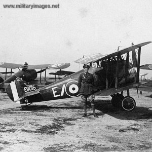 Pilot standing by a Sopwith Camel