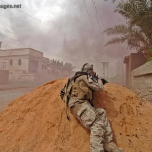 Sgt. Morales lays down gun fire on insurgent positions