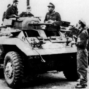 German-Special-Ops-Bulge-042-US-M-8-Armored-Car-SS-150.Panzer-Brigade.jpg