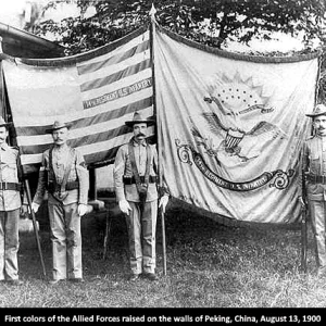 The first colors of the Allied Forces raised on the walls of Peking, China, during the assault...jpg