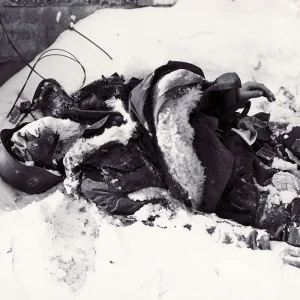 000-A Panzergrenadier of the Waffen SS lies buried in the snow following the fierce fighting n...jpg