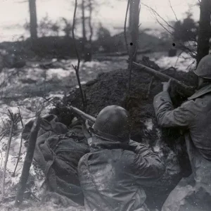 000-Riflemen of the 99th Infantry Division fire on targets near Rocherath December 17 1944.jpg