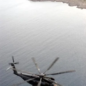 MH-53E Sea Dragon flies just off the coast of Sicily