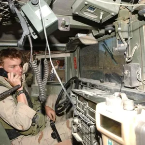 Airman Williams talks to an A-10 Thunderbolt II pilot