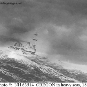 USS Oregon (BB-03) steaming through heavy seas