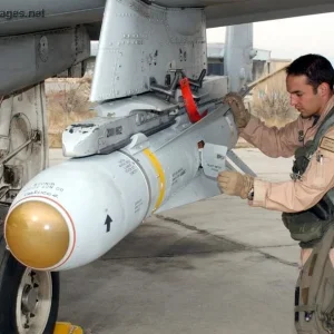 Capt. Erkkila inspects an AGM-65 G Maverick missile