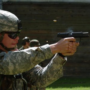 Maj. Jason G. Hogie fires a German P9 pistol