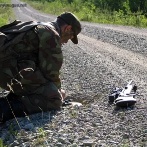 Ranger sniper placing a landmine at Ex Krpp 2005