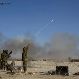 Firing 105 mm Howitzer onto the Wayse Karni Range