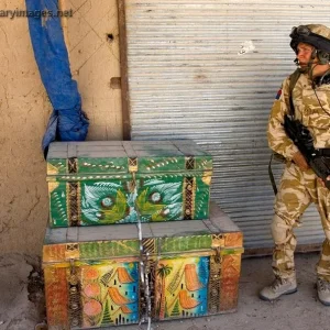 A soldier pauses during a patrol