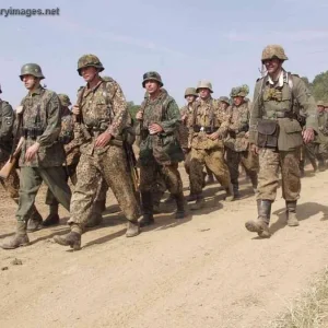 SS Pz Grens move in formation Reenactors