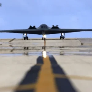 A B-2 Spirit taxis down the flightline