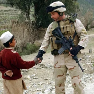 Soldier is warmly greeted in Manoi, Afghanistan