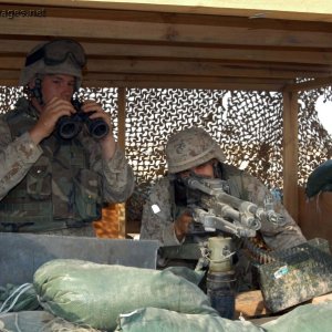 Marines stand watch at an outpost