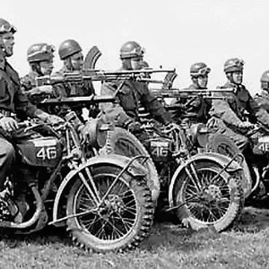 Motorcycle_Bren_Gun_teams_Royal_Montreal_Regt_UK_28_Apr_1942_MIKAN_No_35930