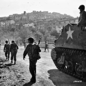 3rd_Infantry_Division_Troops_and_M7_Priest_Cori_Italy_1944