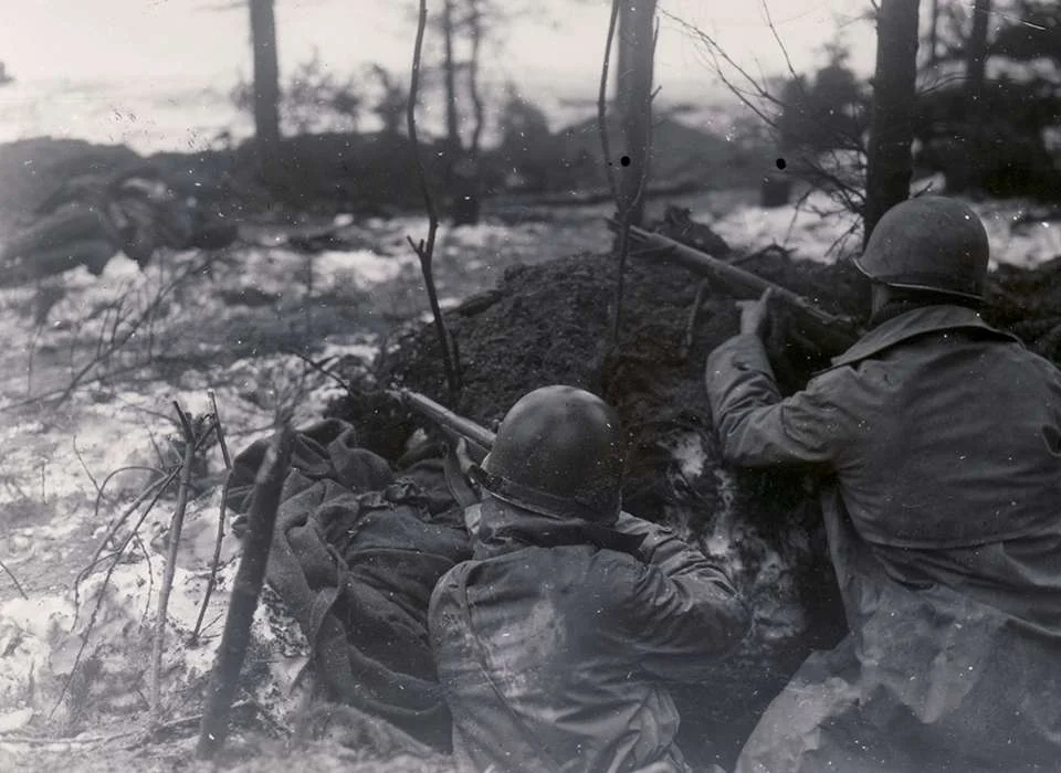 000-Riflemen of the 99th Infantry Division fire on targets near Rocherath December 17 1944.jpg