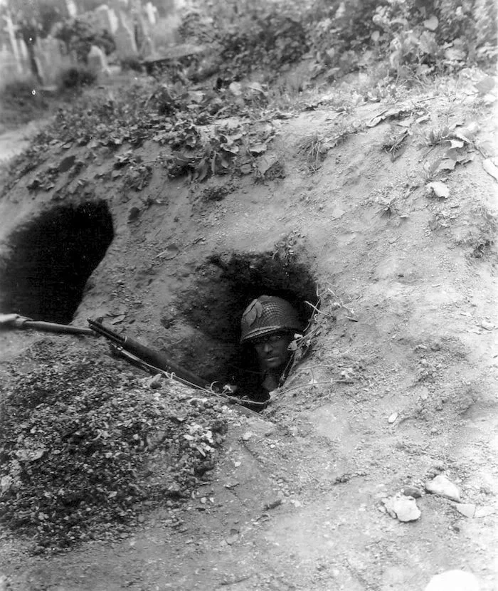 1944 WWII US Soldier Seeks Cover In Foxhole Saint-Lô, Normandy, France ...