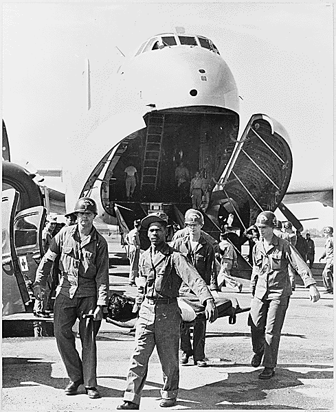 1952 October, Army Medics Carry Wounded UN Personnel To Wait