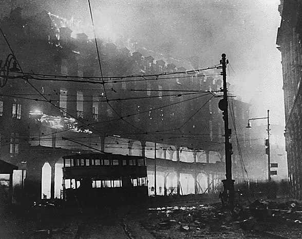 A double-decker tram in a fire storm.