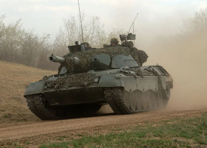 A Leopard from The Royal Canadian Dragoons (RCD) fires