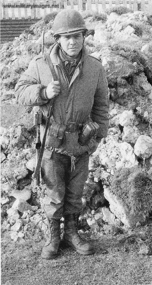 Argentine Army conscript stands outside a bunker