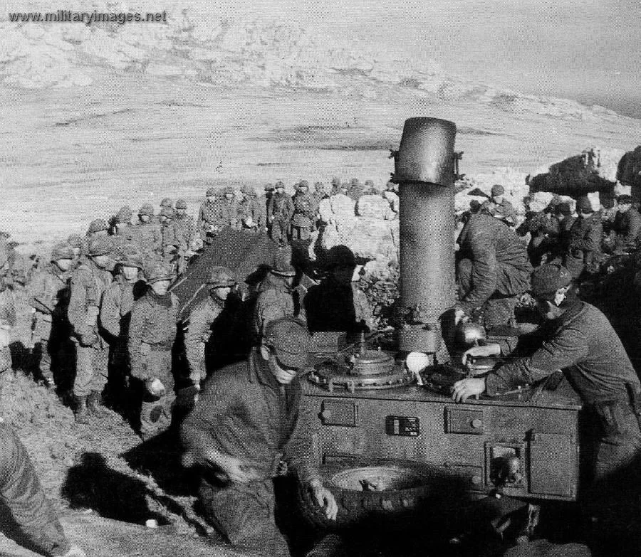 Argentine Marine Infantry queue for their food