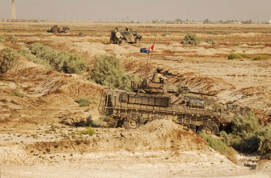 Australian Light Armoured Vehicle and two Bushmasters | A Military ...